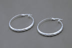 Subtle Wave Hoop Earrings in Sterling Silver — view 2