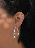 Subtle Wave Hoop Earrings in Sterling Silver — view 3