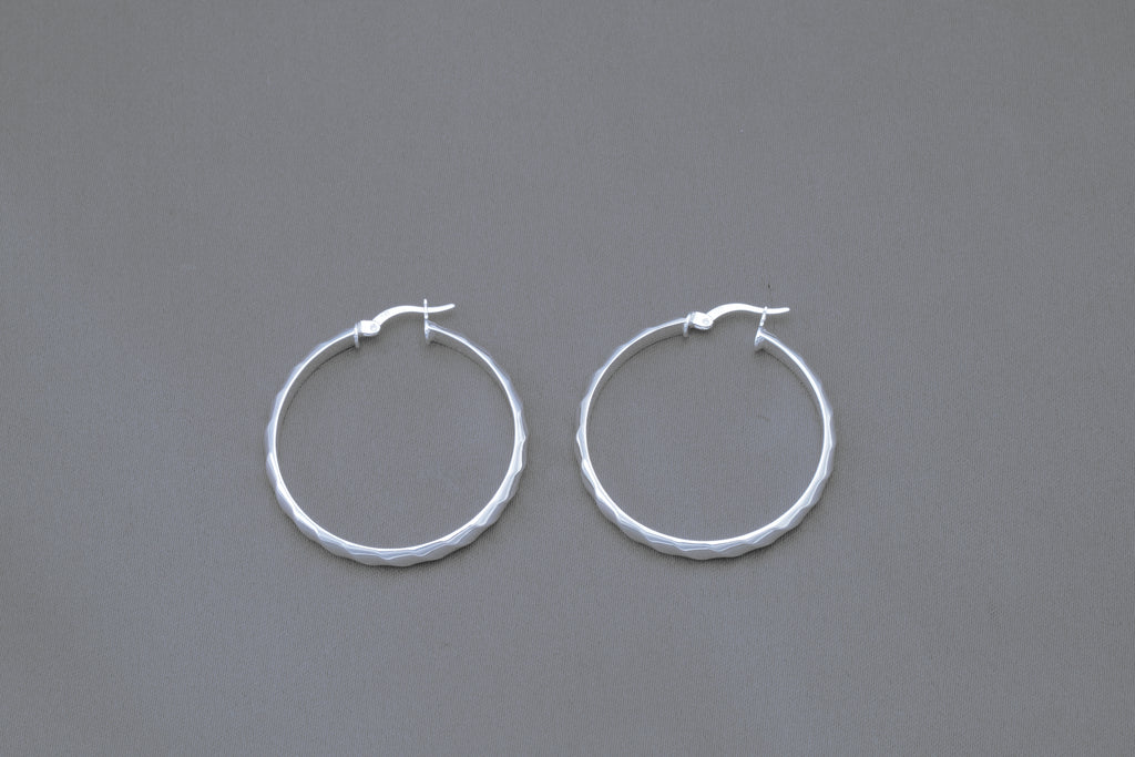 Subtle Wave Hoop Earrings in Sterling Silver