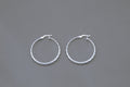 Subtle Wave Hoop Earrings in Sterling Silver